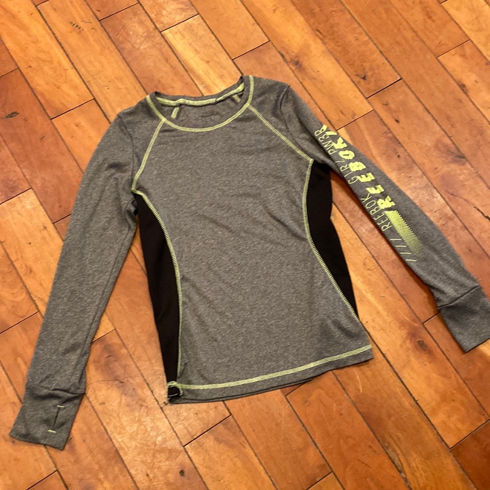 Reebok youth large. Girls.
Thumb cut outs